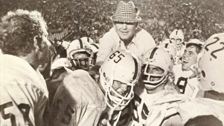 labama coach Paul "Bear" Bryant is carried off the field by his Crimson Tide players after surprising USC in the 1971 season opener