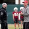 Alabama coach Kalen DeBoer speaks with offensive coordinator Ryan Grubbs