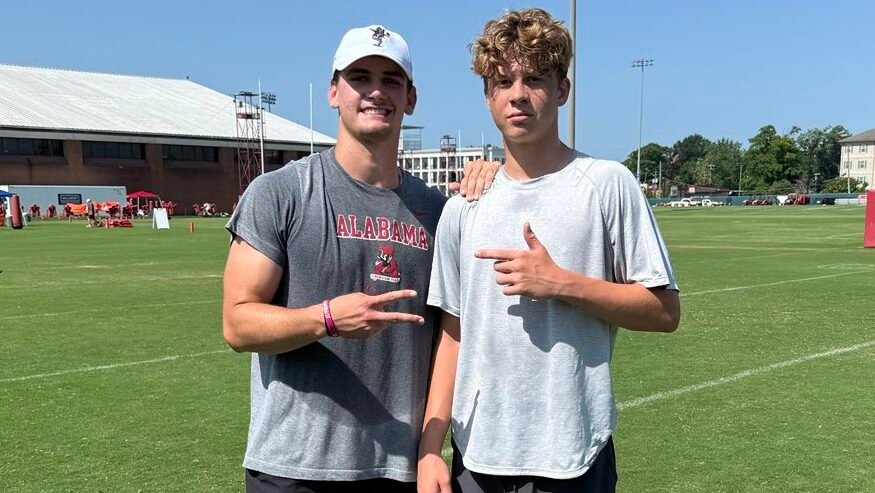 Alabama Crimson Tide quarterback with 2028 quarterback prospect Knox Kiffin at the Alabama high school quarterback camp.