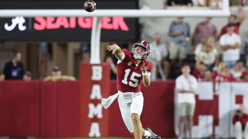 Alabama quarterback Ty Simpson attempts pass.