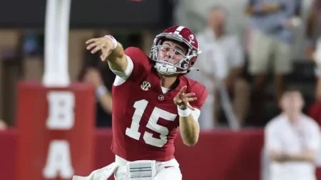 Alabama quarterback Ty Simpson attempts pass.